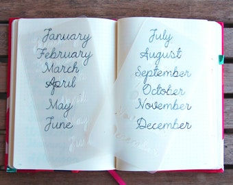 Cursive Months of the Year Bullet Journaling Stencil Set adds fancy lettering to your bujo layouts. Get it here.