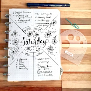 Compass Protractor™ bullet journaling stencil makes perfect concentric circles in your bullet journal. Get it exclusively here. image 1