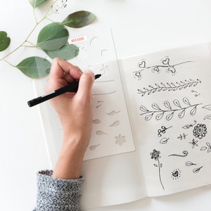 Flower and Vine Bullet Journaling Stencil creates a variety of floral doodles in your bujo. Get it exclusively here.