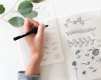 Flower and Vine Bullet Journaling Stencil creates a variety of floral doodles in your bujo. Get it exclusively here.