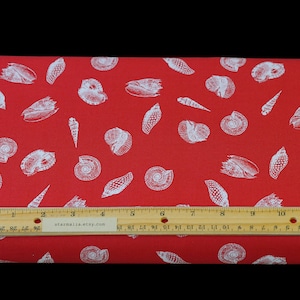 May include: Red fabric with a white seashell pattern. The fabric is measured with a ruler that reads "starnalia.etsy.com".
