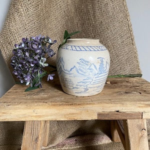 May include: A set of three ceramic mugs with a speckled, matte finish in cream, light grey, and dark grey. Each mug has a simple, minimalist design, suitable for coffee or tea.