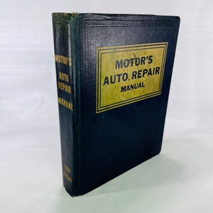 May include: A black hardcover book titled "Motor's Auto Repair Manual". The title is in gold lettering on a gold background. The book is a 16th edition.