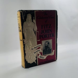 May include: The cover of a book titled "The Celebrated Case of Fitz John Porter: An American Dreyfus Affair" by Otto Eisenschiml. The cover features a woman holding a scale of justice and a sword, and a portrait of Fitz John Porter.
