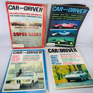Four vintage Car and Driver magazines (1963–1968) with bold covers and visible water staining, plus interior pages showing contents lists, racing features, and full-page car ads.