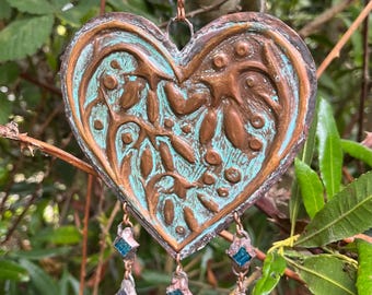 Corazón decorativo de cobre y vidrio