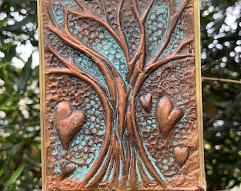 Móvil en cobre y latón