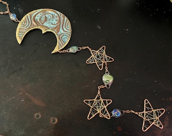 Luna creciente en cobre y latón