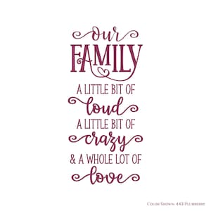 May include: A plum-colored wall decal with the words "Our Family" in a decorative font. Below, the text continues with "A little bit of loud, a little bit of crazy, & a whole lot of love." The color is 443 Plumberry.