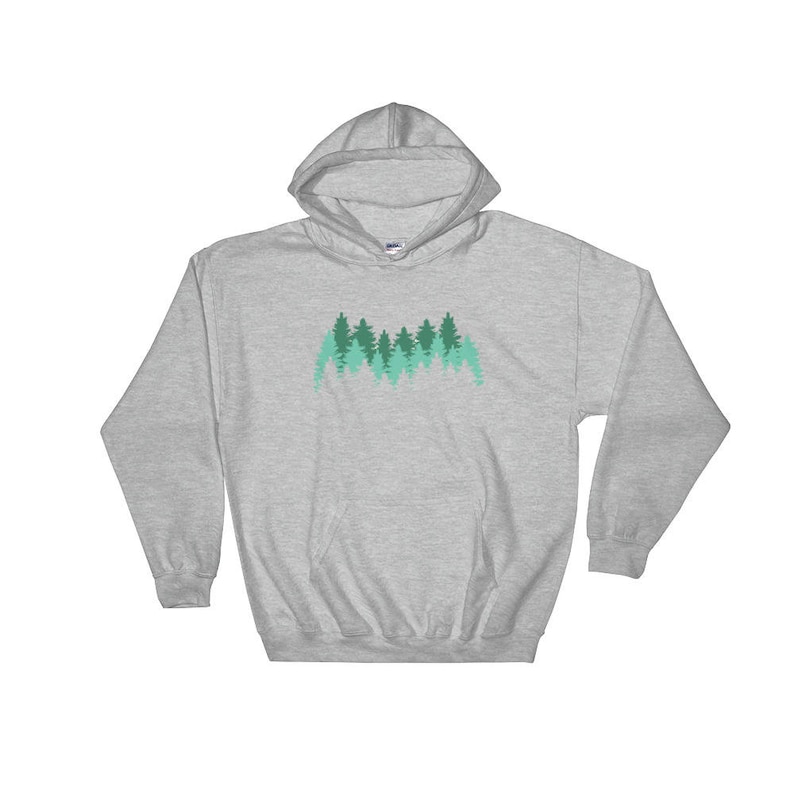 May include: A heather grey hooded sweatshirt with a forest silhouette design in shades of green. The design features a row of trees with a gradient of green hues.