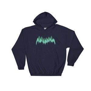 May include: Navy blue hooded sweatshirt with a green silhouette of a forest on the front.
