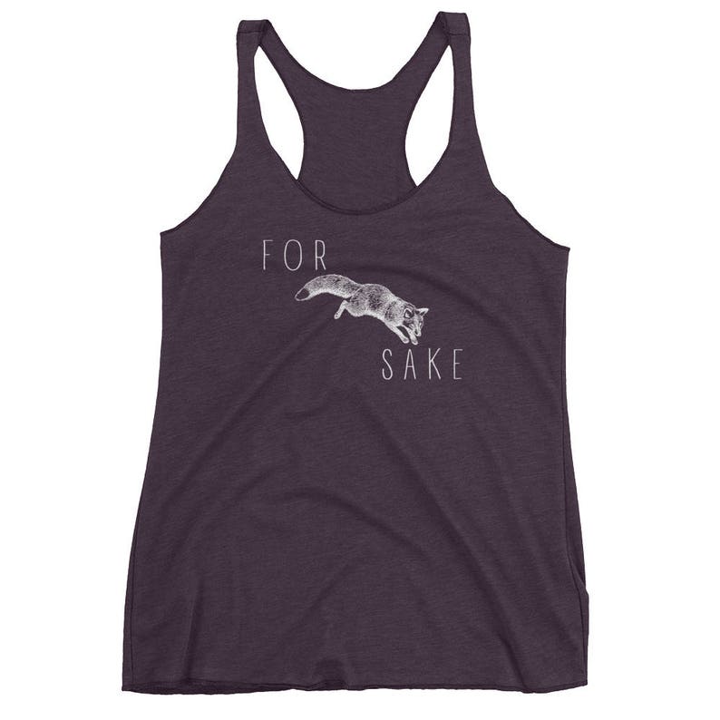 May include: Purple tank top with a white graphic of a fox jumping and the text "FOR SAKE".