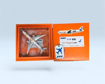 Etiqueta de equipaje B777-300 JA789A de All Nippon Airways y modelo a escala 1:400.