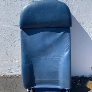Retired Delta passenger seat back