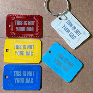 This is Not Your Bag aluminum luggage tag