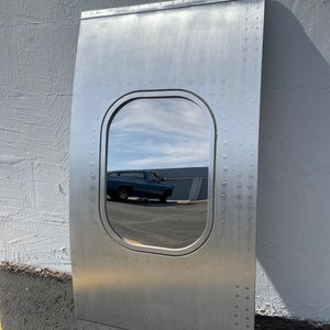 Former American Airlines B757-200 aircraft fuselage window mirror