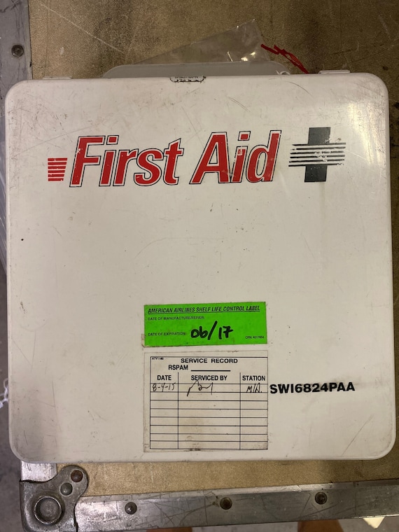 Retired American Airlines and generic aid kit
