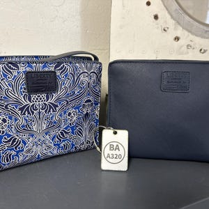 British Airways First Class amenity kit & BA A320 luggage tag