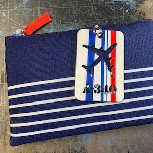 Air France Overnight Kit & A-340 aircraft fuselage key chain Bundle.