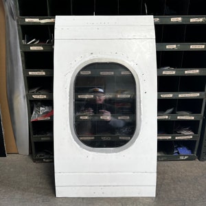 Retired Delta Airlines MD88 fuselage window