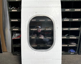Retired Delta Airlines MD88 fuselage window