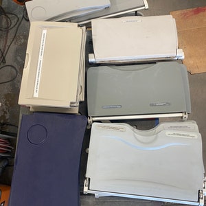 Retired Airline passenger seat back tray tables