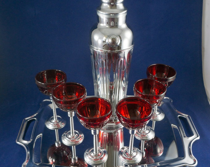 Featured listing image: Vintage Chrome Stainless Shaker Pitcher and Nine Red Art Deco Glasses on Chrome Stems and a Tray