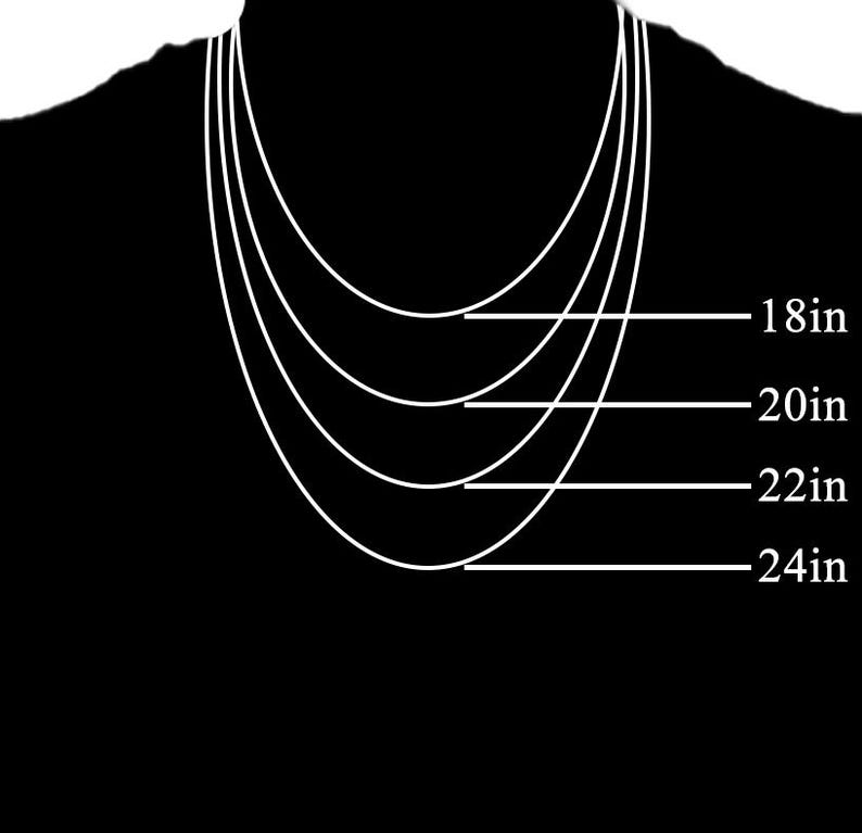 May include: A black background with four white necklaces of varying lengths, labeled 18in, 20in, 22in, and 24in. The necklaces are displayed in a curved shape, suggesting how they would hang when worn.