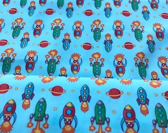 Cotton fabric with rockets, space, light blue, red, yellow, perfect for makeshift masks