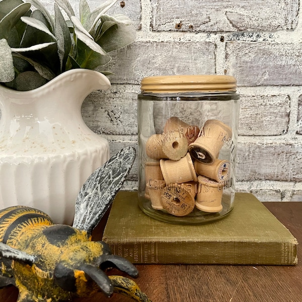 Glass Jar with Thread Spools! Commercial Paste Co Lidded Jar with Enamel Lid!