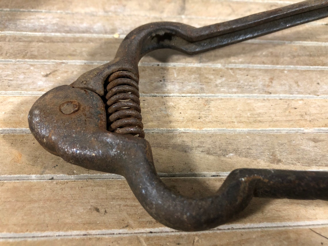 cast iron coal tongs