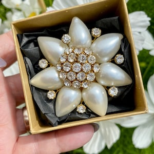 CHANEL CC Brooch in Gilded Metal set with Pearls at 1stDibs