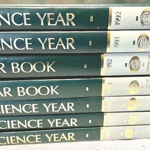 The World Book Science year annuals set of 7 vintage science books faux leather gold gilt science books collection from the 90&#39;s bulk lot