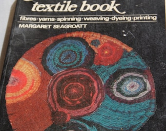 A BASIC TEXTILE BOOK fibres yarns spinning weaving dyeing printing Margaret Seagroat 1975 vintage craft book textile book vintage book