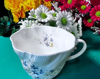 Taza de té vintage de porcelana fina Royal Heritage – Inglaterra