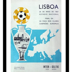 May include: A vintage poster advertising the 1967 European Cup Final in Lisbon, Portugal. The poster features a blue and white map of Europe, a gold trophy, and a football. The text on the poster reads "Lisboa, 25 de Maio de 1967, Estádio Nacional, Final da XII Taça dos Clubes Campeões Europeus, Inter-Celtic, Itália, Escócia."