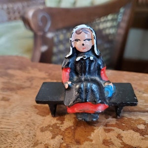 Vintage Cast Iron Amish Girl on Bench