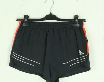 taille de short de sport ADIDAS vintage. Short L noir rouge avec logo imprimé