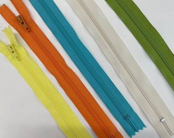 Assortment of brightly colored plain zippers