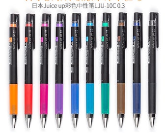 May include: A set of ten Juice Up 0.3 gel pens in various colors, including orange, red, pink, purple, blue, turquoise, green, brown, and blue. The pens are black with a silver tip and feature the text "Juice Up 0.4" on the side.