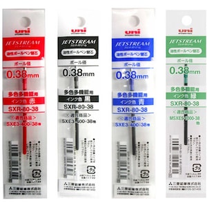 May include: Four packages of Jetstream pen refills, each with a different color ink: red, black, blue, and green. The packages are labeled with the ink color and the corresponding refill number. The refills are 0.38 mm in diameter.