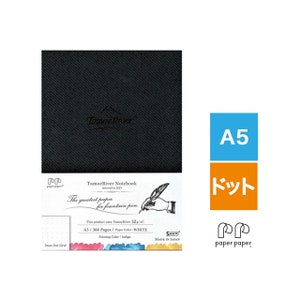 May include: A black notebook with the text "TomoeRiver Notebook" and "The greatest paper for fountain pen" on the front cover. The notebook is A5 size and has 368 pages. The paper color is white and the printing color is indigo. The notebook is made in Japan.