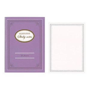 May include: A purple notepad with a gold border and the text "Macaron Color Sticky Notes" and "20 sheets". The notepad is next to a blank white sticky note with a gold border.