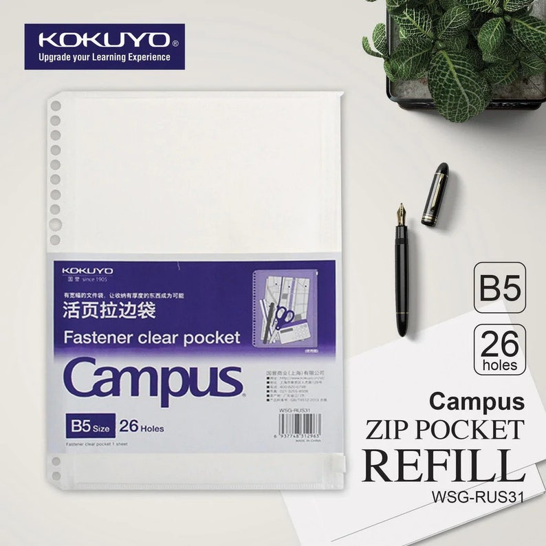 May include: A white plastic B5 size clear pocket refill for a zipper binder. The pocket has 26 holes and is labeled "Campus ZIP POCKET REFILL WSG-RUS31".