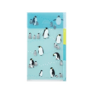 May include: A clear plastic file folder with a blue background and a design of penguins. The folder has multiple tabs for organizing documents.