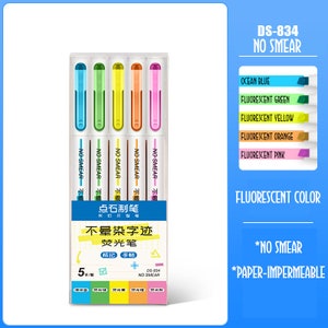 May include: A set of five fluorescent highlighters in a clear plastic package. The colors are ocean blue, green, yellow, orange, and pink. The package says "No Smear" and "Paper-Impermeable".