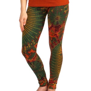 May include: Green, orange, and red tie-dye leggings with a swirling pattern.