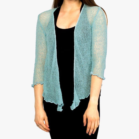 light turquoise sweater