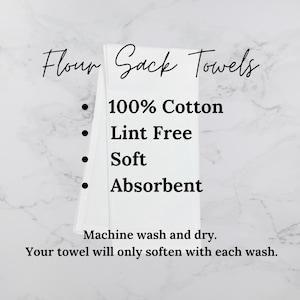 May include: A stack of folded white flour sack towels. Text on the towels reads "Flour Sack Towels", "100% Cotton", "Lint Free", "Soft", and "Absorbent". Additional text states the towels are machine washable and will soften with each wash.