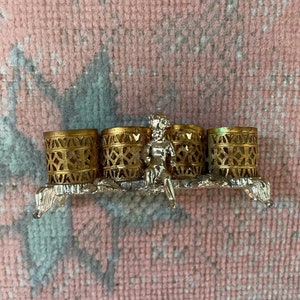 Vintage filigree pierced brass lipstick holder by Sam Fink